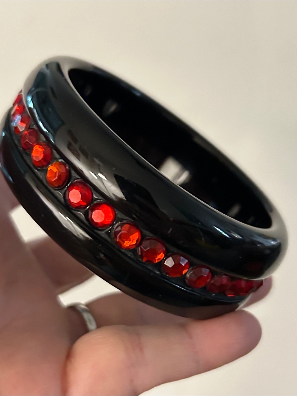 Black lucite bangle with red crystals rhinestones